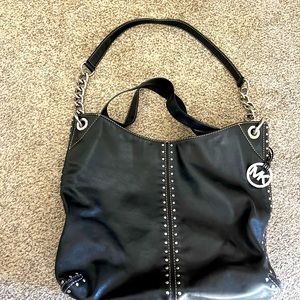 Micheal Kors black leather Uptown Astor large satchel bag.